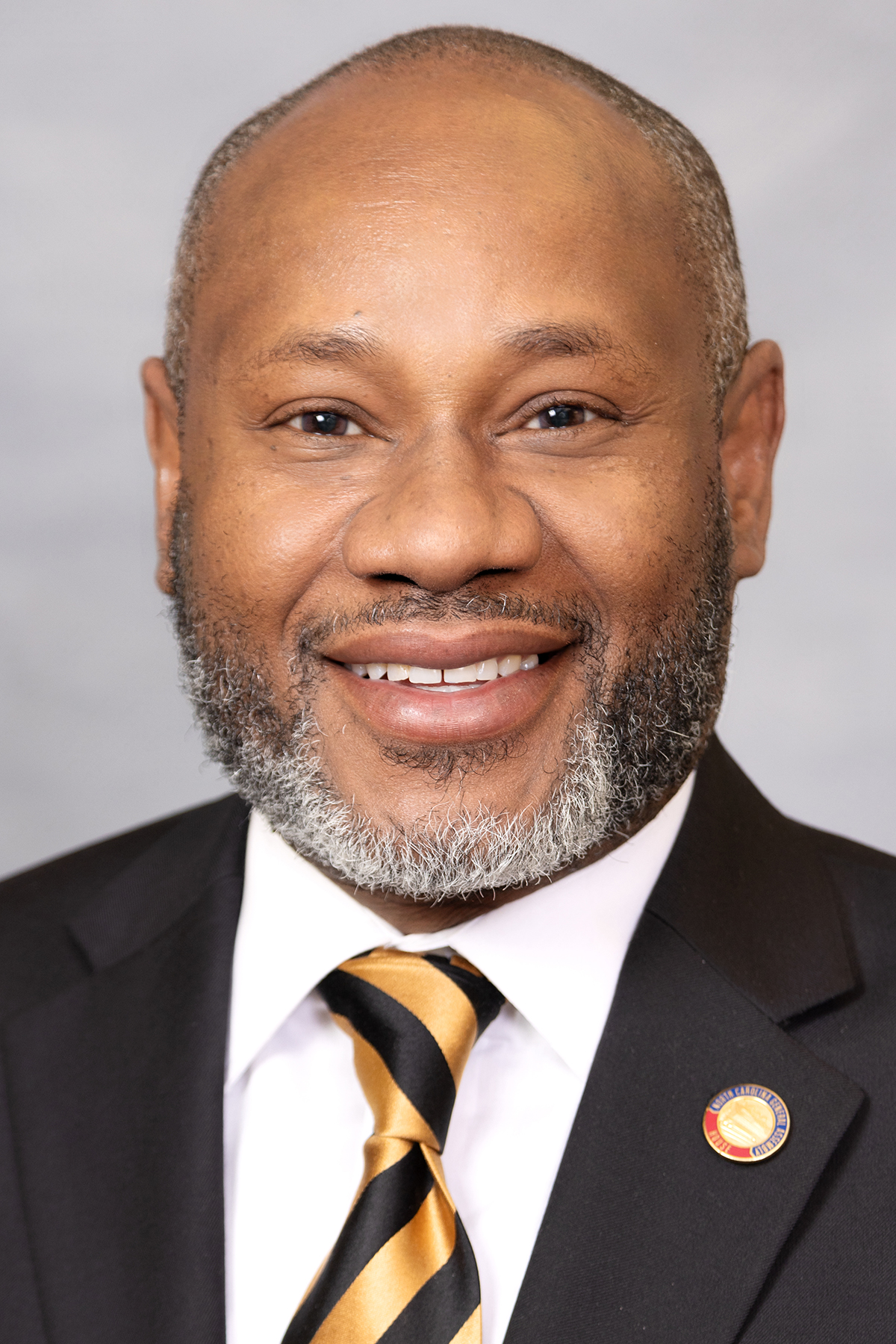Official portrait of Amos L. Quick, III